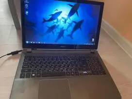 Parduodu seną nešiojamąjį kompiuterį.